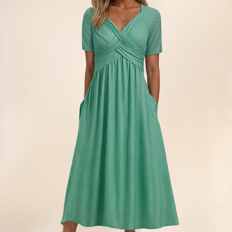 Nonchalant midi jurk met korte mouwen en strikdetail bij de halslijn