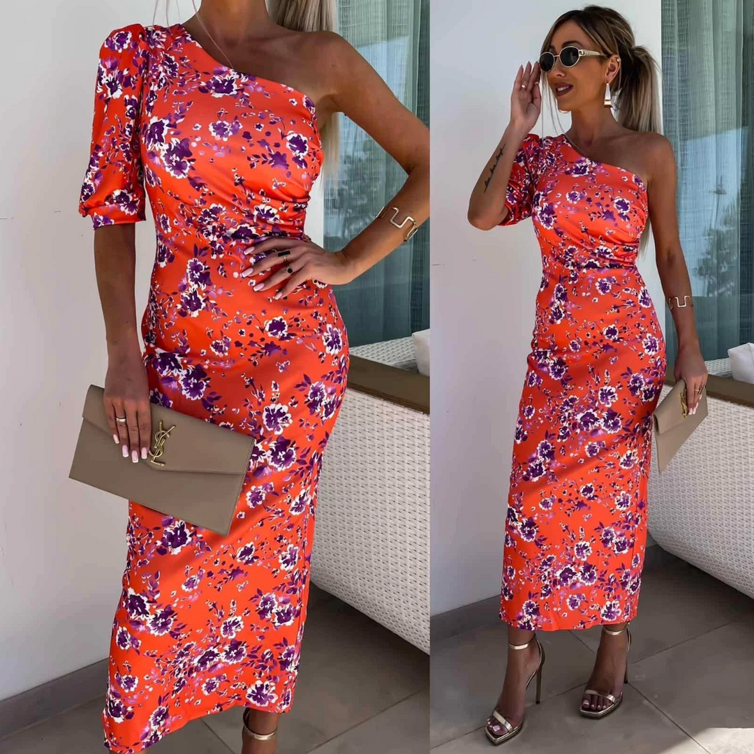 Elegante lange zomerjurk met print en asymmetrische schouder
