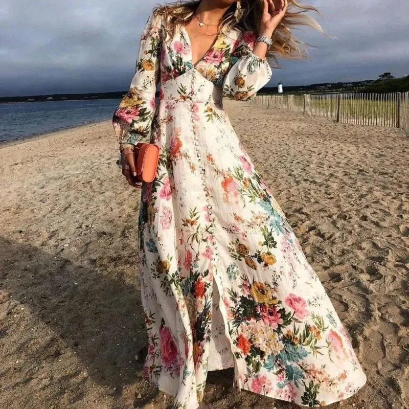 Lange jurk met bloemenprint en knopen voor zomerse dagen