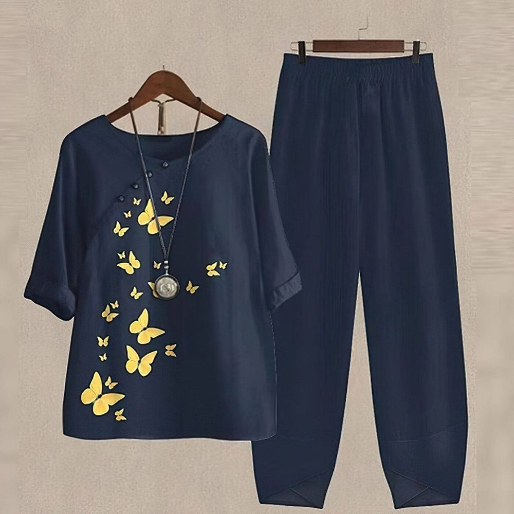 Zomers damespak met bedrukt blouseontwerp en bijpassende broek