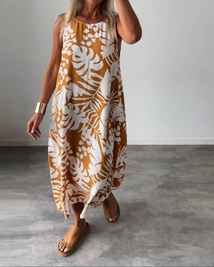 Elegante mouwloze jurk met bladmotief