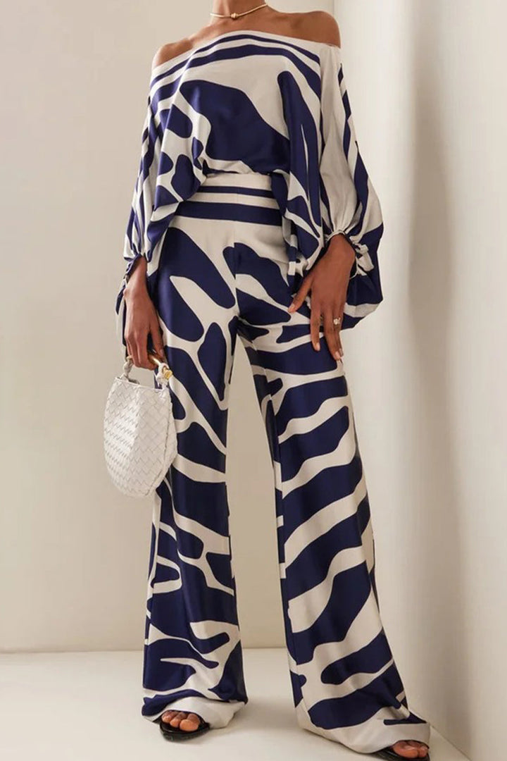 Elegante nonchalant jumpsuit met off-shoulder ontwerp en lange mouwen