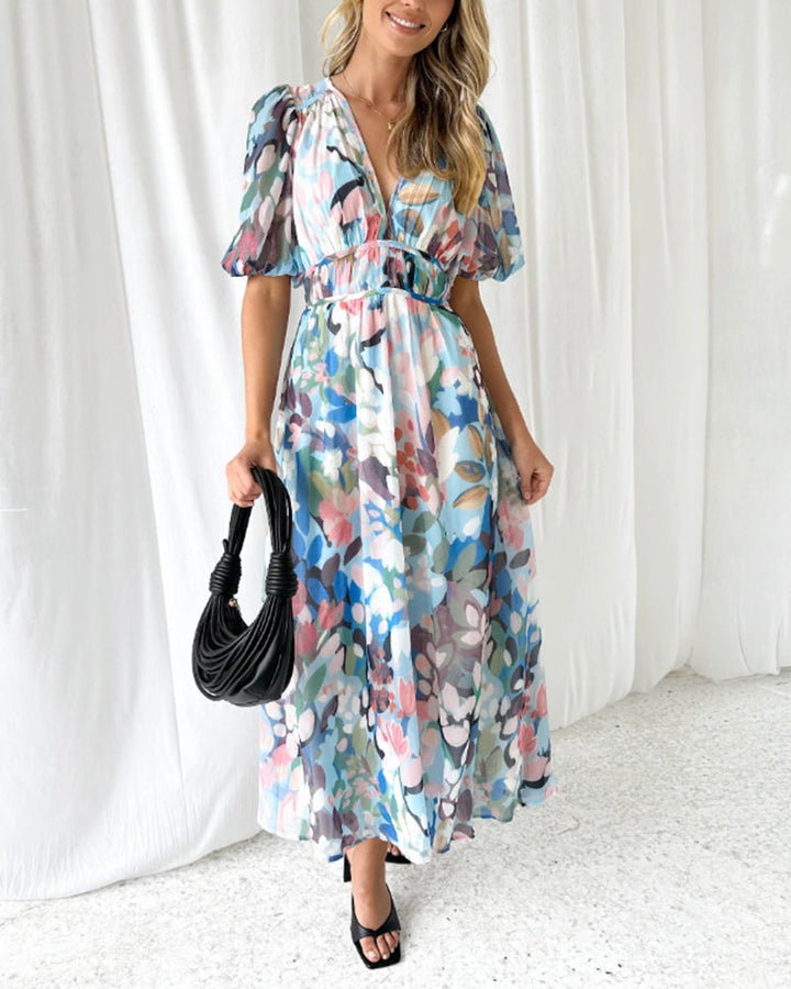 Elegante lange jurk met bloemenprint, lange mouwen en diepe V-hals