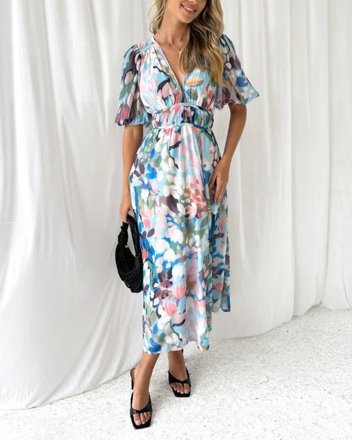 Elegante lange jurk met bloemenprint, lange mouwen en diepe V-hals