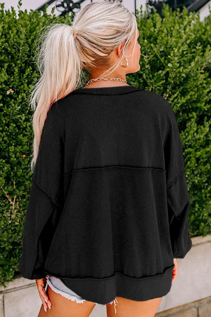 Emma-Zwarte Drop Shoulder Henley Trui met Knoopsluiting voor Dames