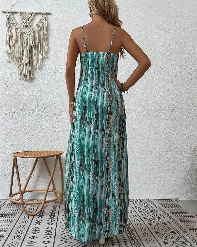 Rebecca - Chique spaghettiband maxi jurk met abstracte print