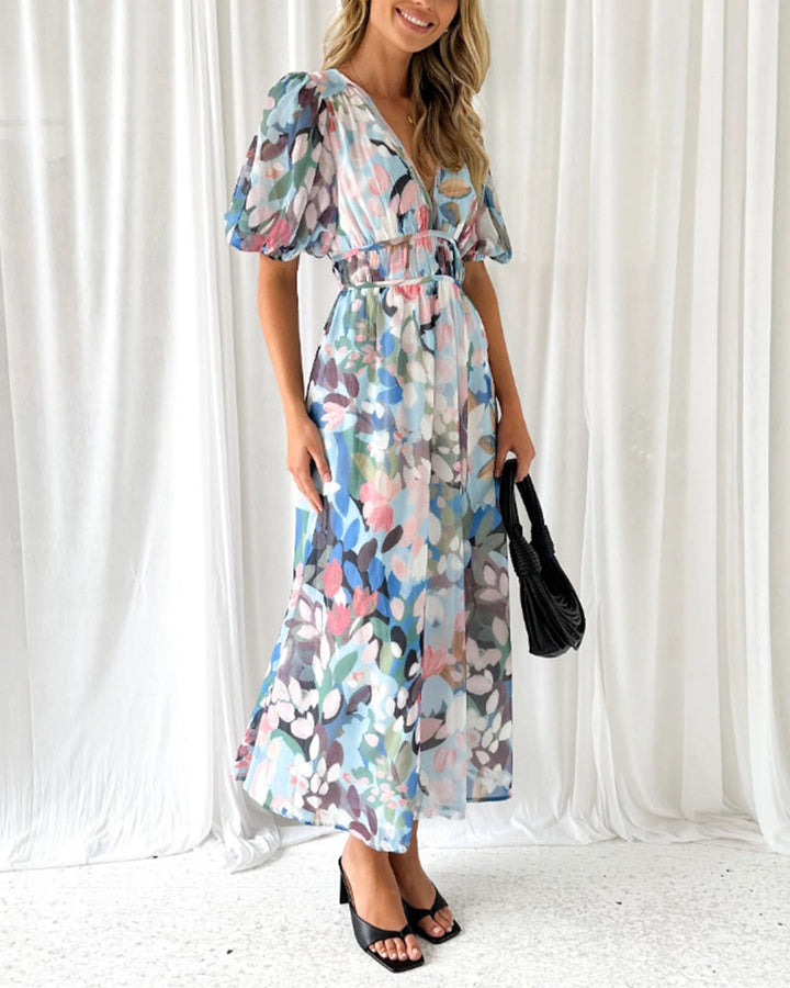 Elegante lange jurk met bloemenprint, lange mouwen en diepe V-hals