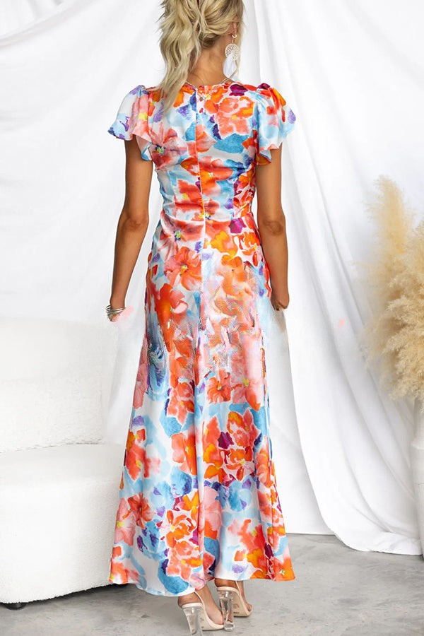 Lange jurk met bloemenprint en korte mouwen perfect voor feestdagen en stijlvolle momenten