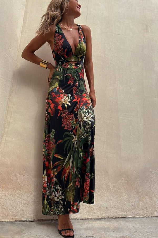 Lange crossover jurk met tropische print en open rug perfect voor zomerse gelegenheden