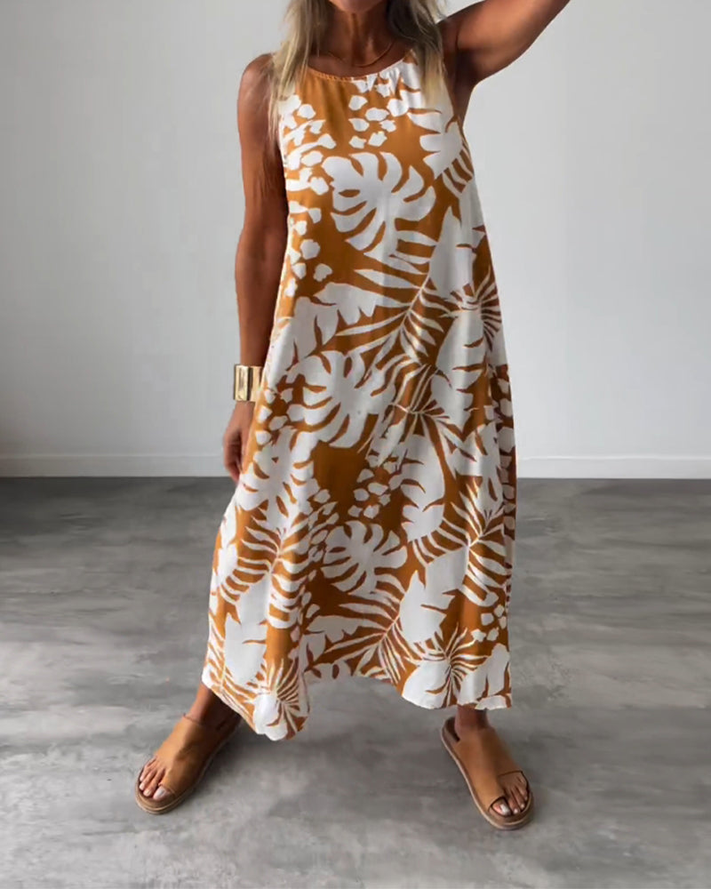 Elegante mouwloze jurk met bladmotief