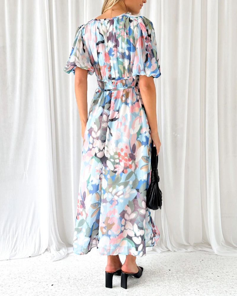 Elegante lange jurk met bloemenprint, lange mouwen en diepe V-hals