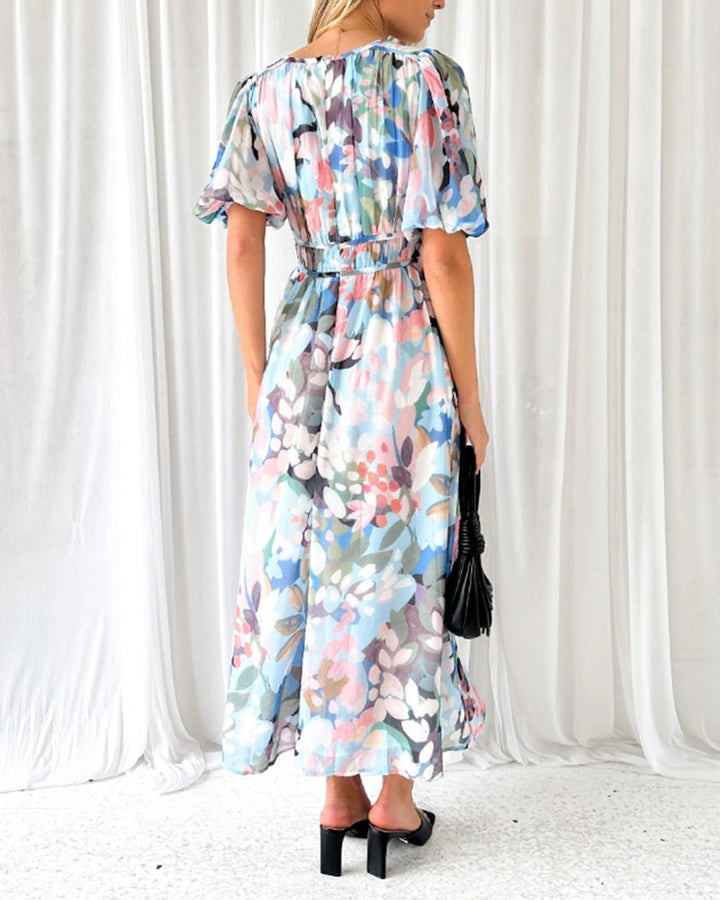 Elegante lange jurk met bloemenprint, lange mouwen en diepe V-hals