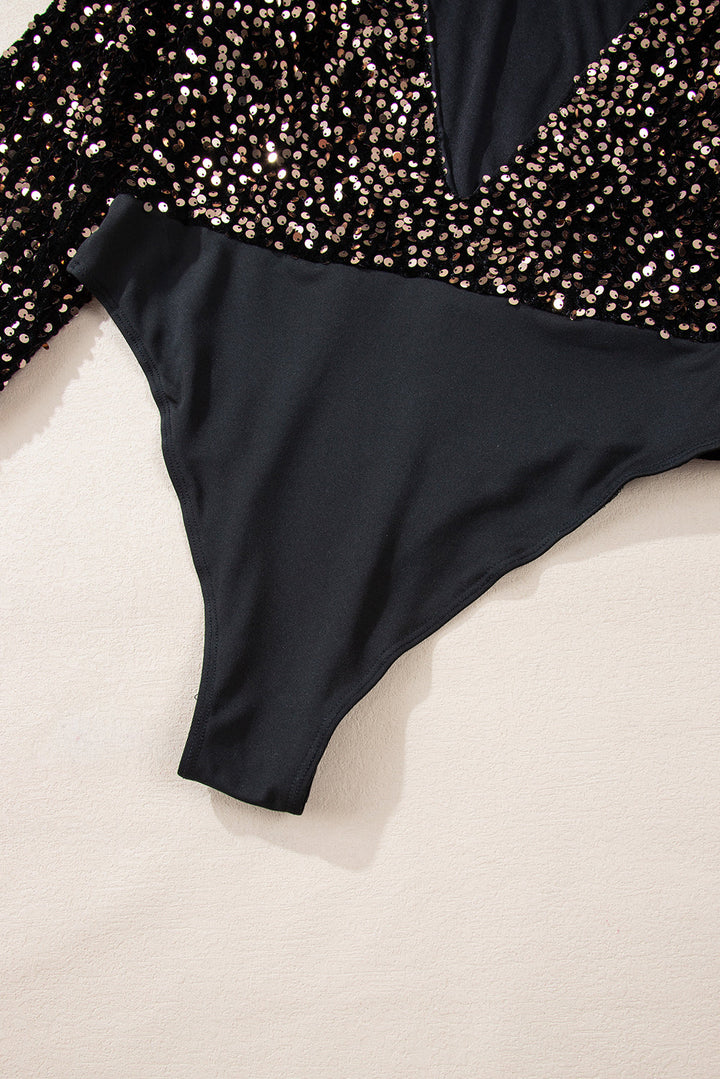 Elegante body met diepe V-hals, glinsterende accenten en pofmouwen