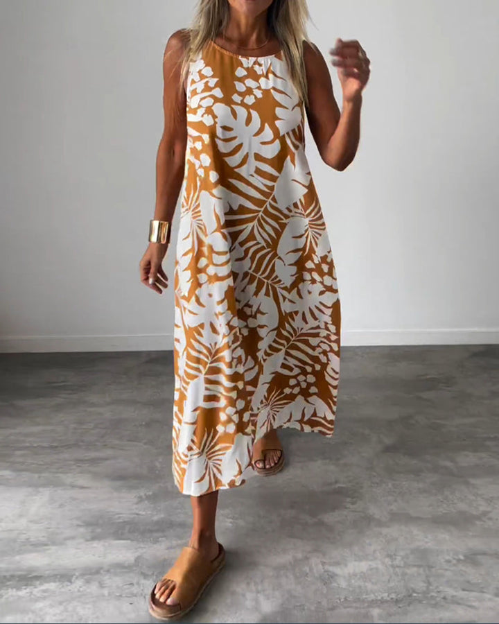 Elegante mouwloze jurk met bladmotief