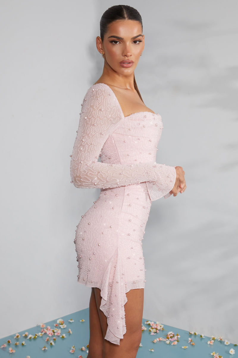 Stijlvolle mini-jurk met pareldetails en lange mouwen voor dames