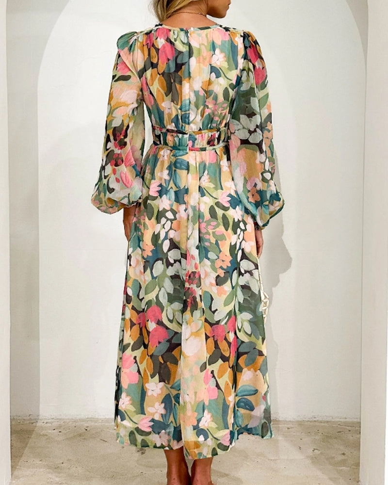 Elegante lange jurk met bloemenprint en ballonmouwen
