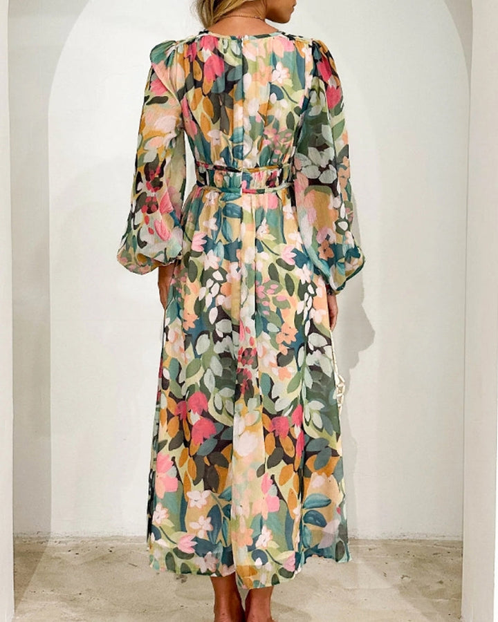 Elegante lange jurk met bloemenprint en ballonmouwen
