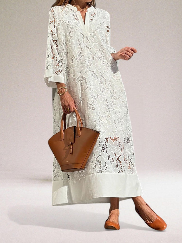 Lange elegante jurk met sierlijke opengewerkte details en tijdloos ontwerp