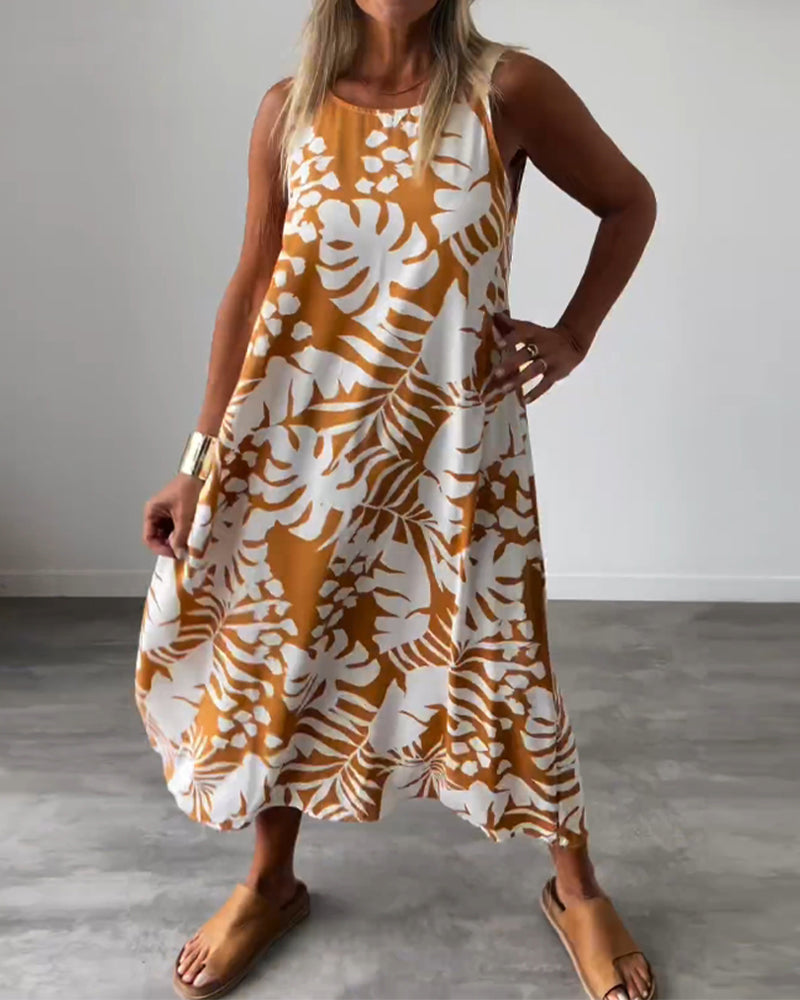 Elegante mouwloze jurk met bladmotief