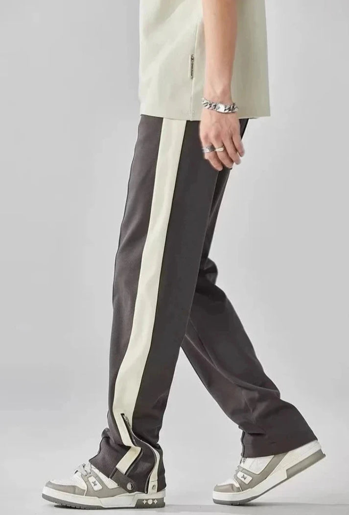 Elegante broek met gecombineerde details: nadruk op originaliteit en stijl