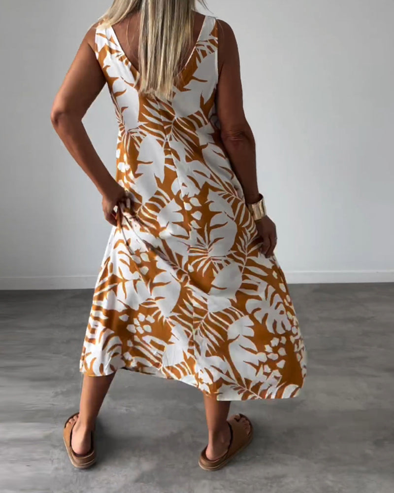 Elegante mouwloze jurk met bladmotief