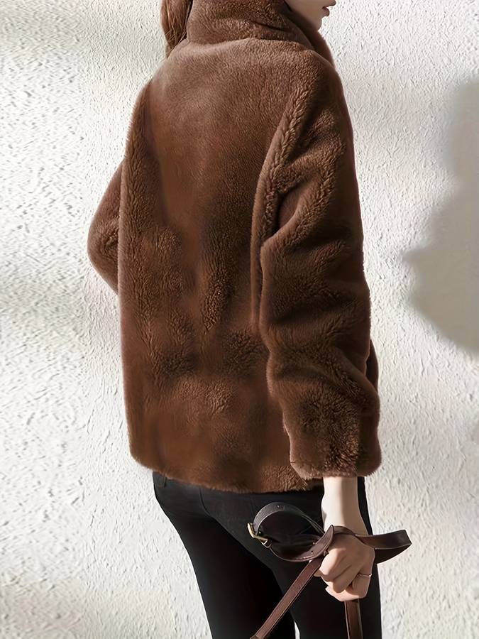 Damesjas met zakken en een trendy ontwerp