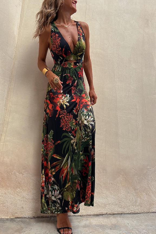 Lange crossover jurk met tropische print en open rug perfect voor zomerse gelegenheden