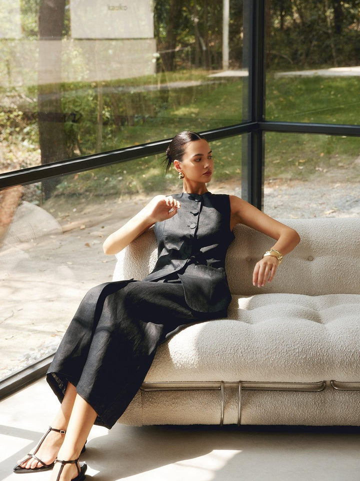 Dames set met klassieke mouwloze vest met knopen en lange rok