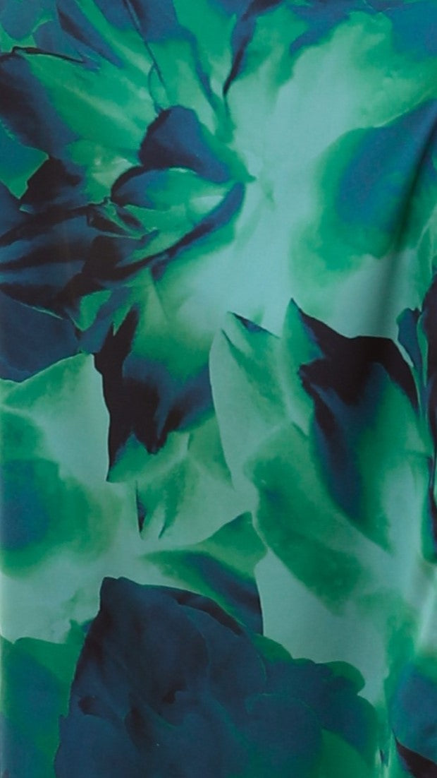 Zomerse lange jurk met één schouder en hoge hals met bloemenprint