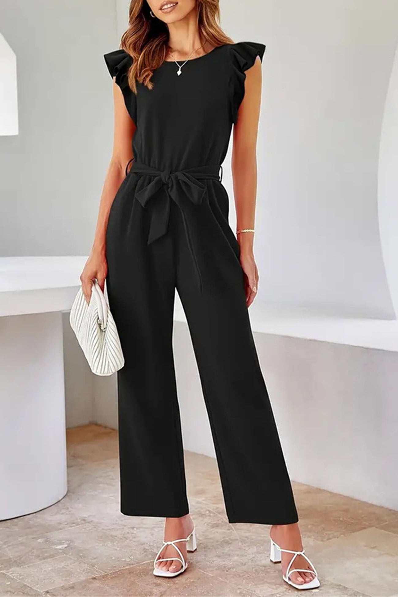 Ruth - mouwloze jumpsuits met ruches