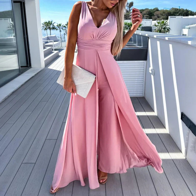 Elegante jumpsuit met diepe halslijn wijde pijpen en stijlvolle sleep