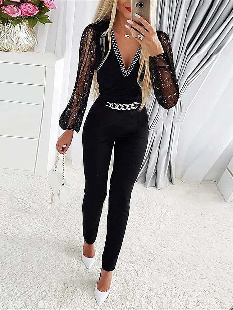 Stijlvolle dames jumpsuit met elegante uitstraling en glanzende mouwen