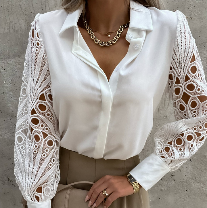Damesblouse met sierlijke lange mouwen en verfijnde uitstraling