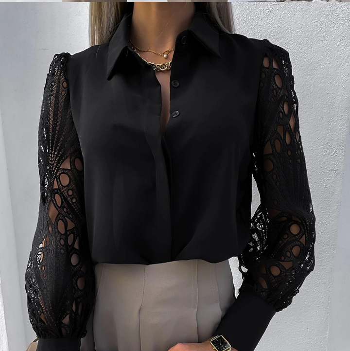 Damesblouse met sierlijke lange mouwen en verfijnde uitstraling