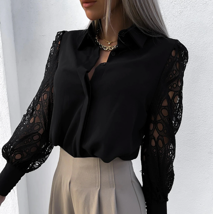 Damesblouse met sierlijke lange mouwen en verfijnde uitstraling