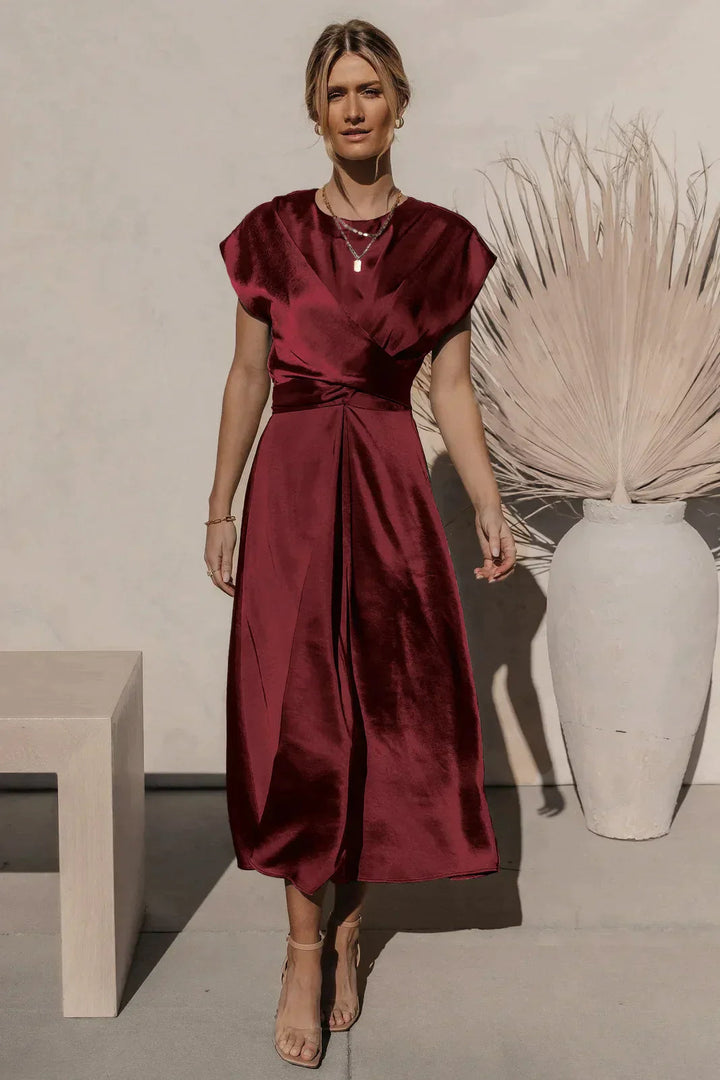 Elegant klassieke midi-jurk met korte mouwen en strik achteraan