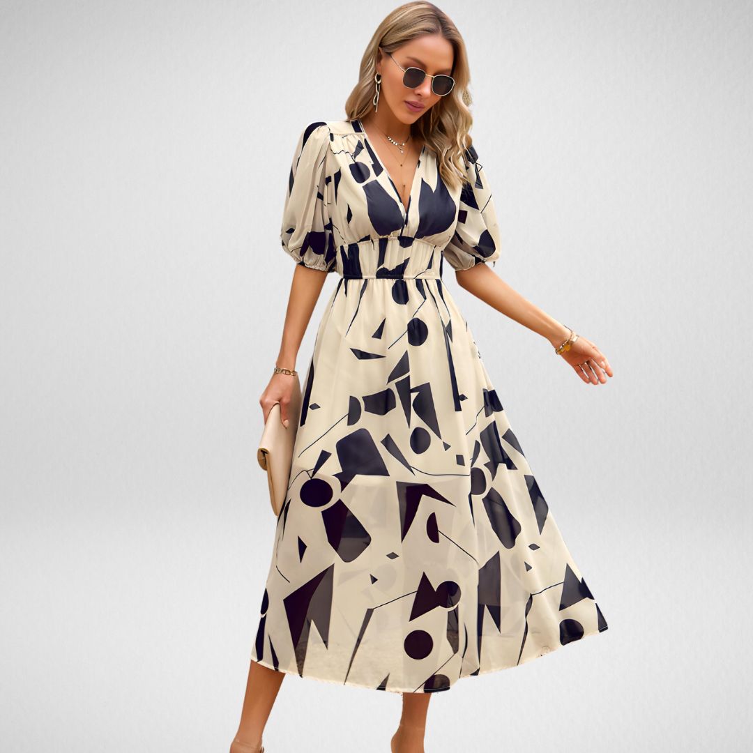 Midi jurk met geometrisch patroon en korte lanternmouwen