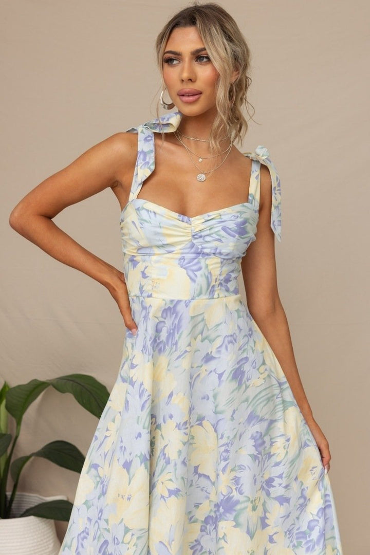 Midi jurk met print en verstelbare bandjes voor een luchtige en elegante uitstraling