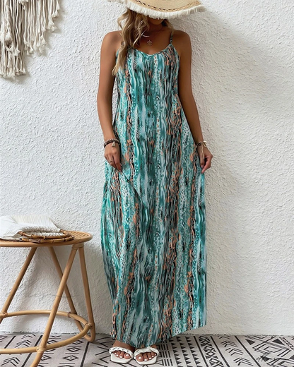 Rebecca - Chique spaghettiband maxi jurk met abstracte print