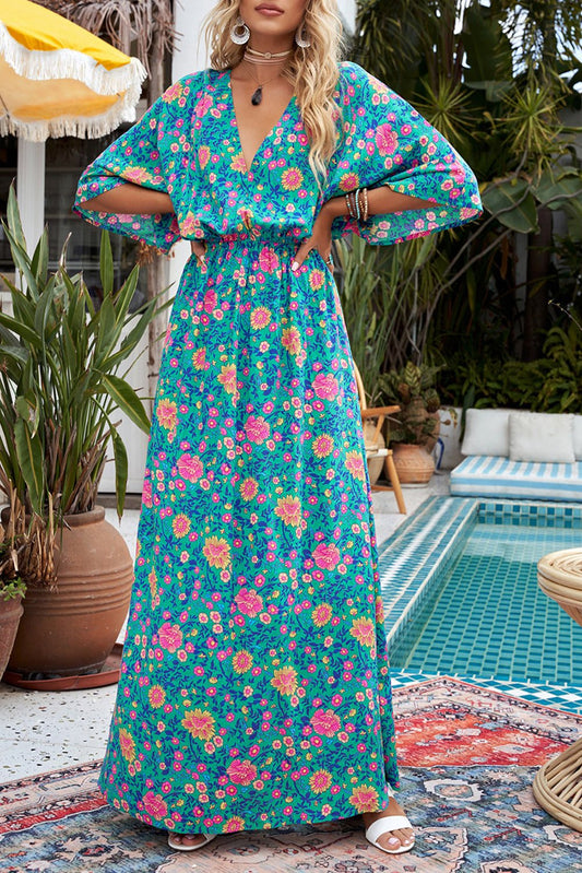 Claudia - Groene bohemian maxi jurk met diepe V-hals en bloemenprint