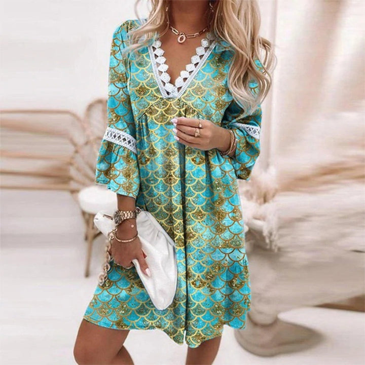 Bloemenjurk met elegante kanten afwerking voor zomerse momenten