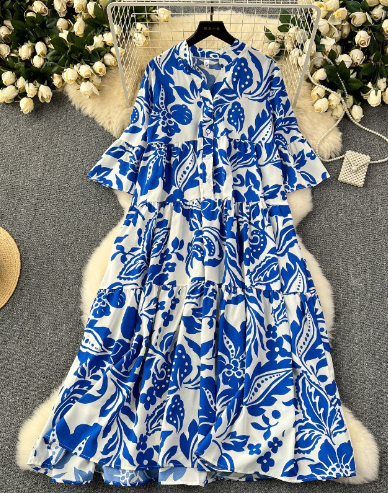 Lola - Oversized V-hals maxi jurk met bloemen in blauw en wit