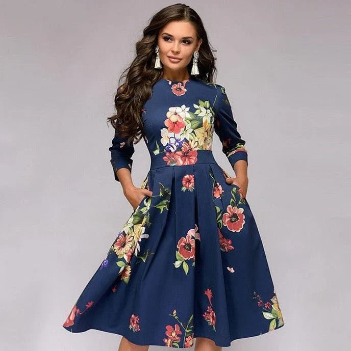 Stijlvolle midi-jurk met wijde rok en bloemenpatroon voor een elegante uitstraling