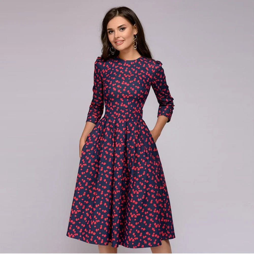 Stijlvolle midi-jurk met wijde rok en bloemenpatroon voor een elegante uitstraling