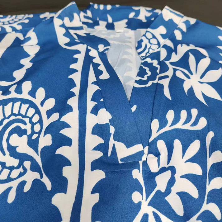 Lange elegante damesjurk met v patroon perfect voor feestelijke gelegenheden